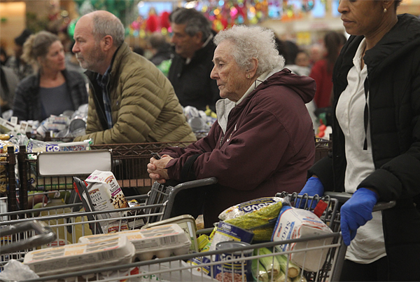 senior citizen in grocery store